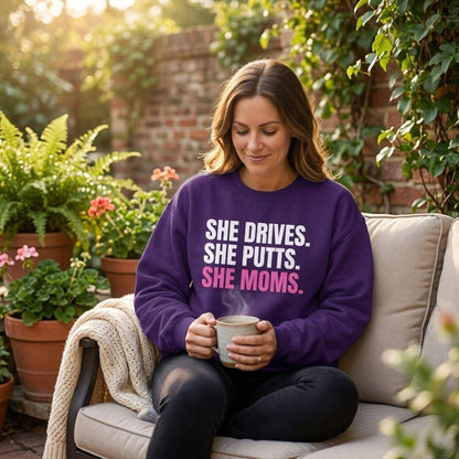 SHE DRIVES. SHE PUTTS. SHE MOMS. - Adult Golf Sweatshirt