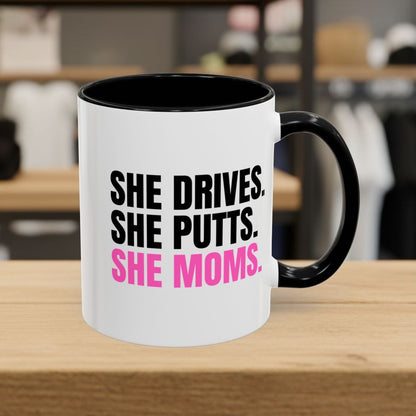 SHE DRIVES. SHE PUTTS. SHE MOMS. - Golf Mug in Black