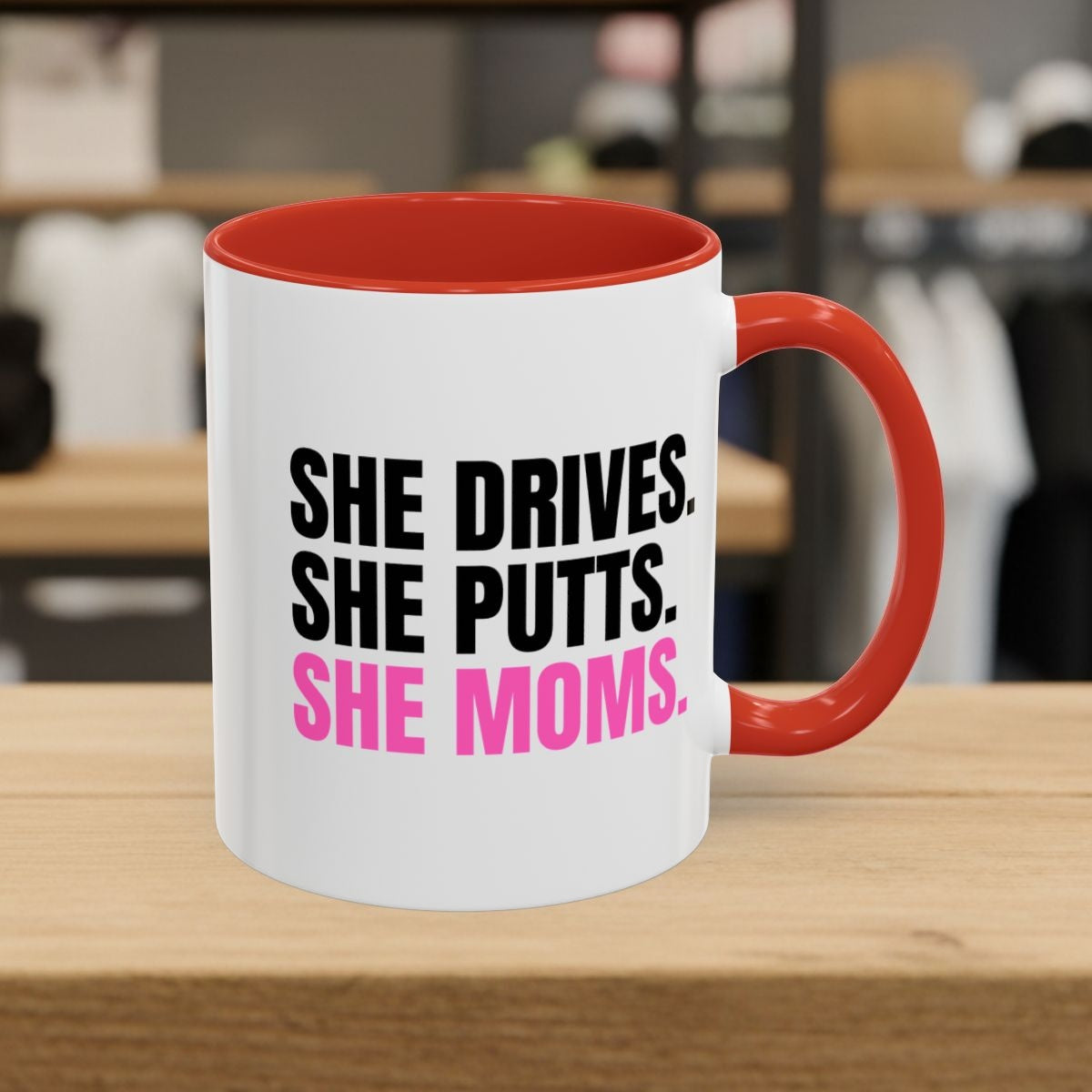 SHE DRIVES. SHE PUTTS. SHE MOMS. - Golf Mug in Red