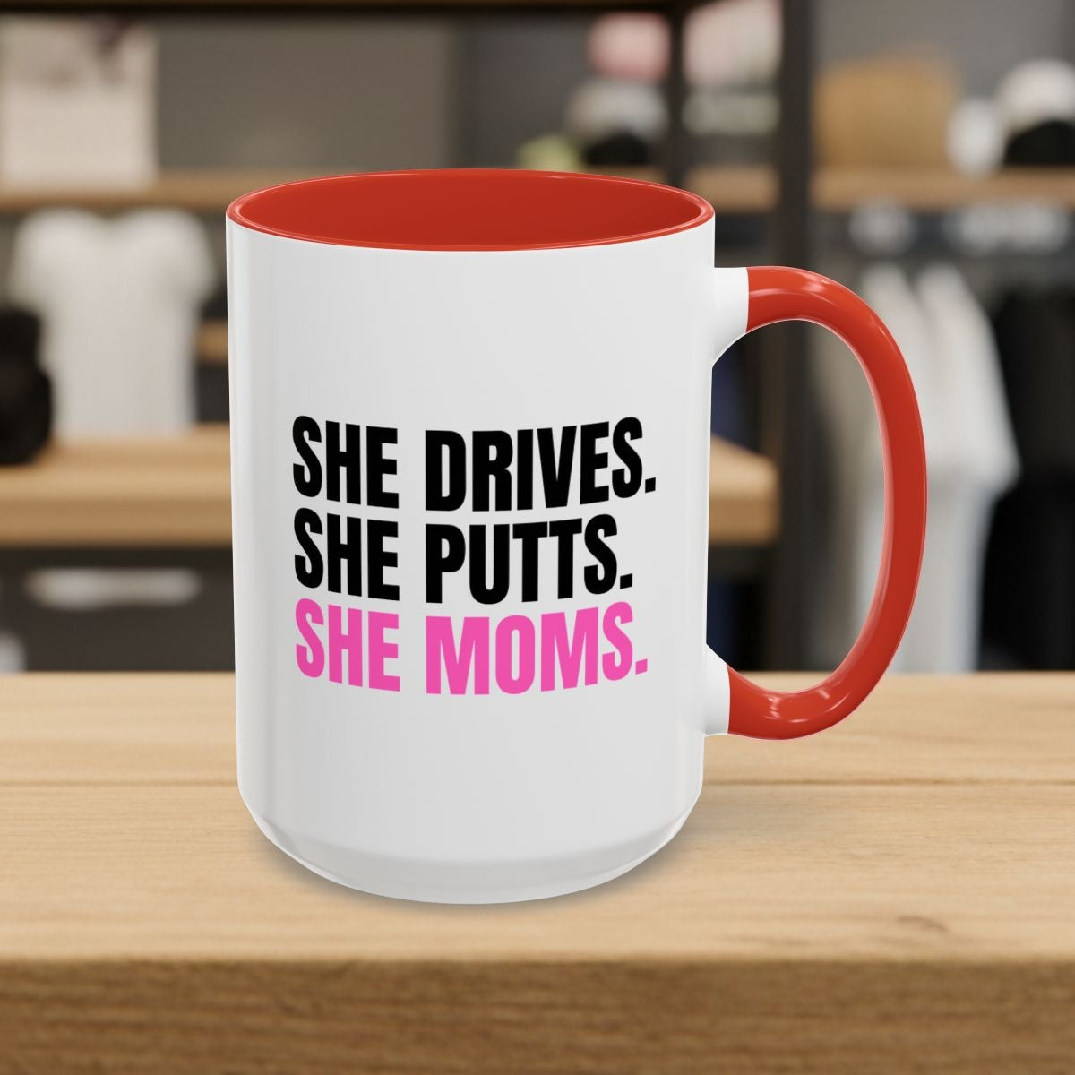 SHE DRIVES. SHE PUTTS. SHE MOMS. - Golf Mug in Red
