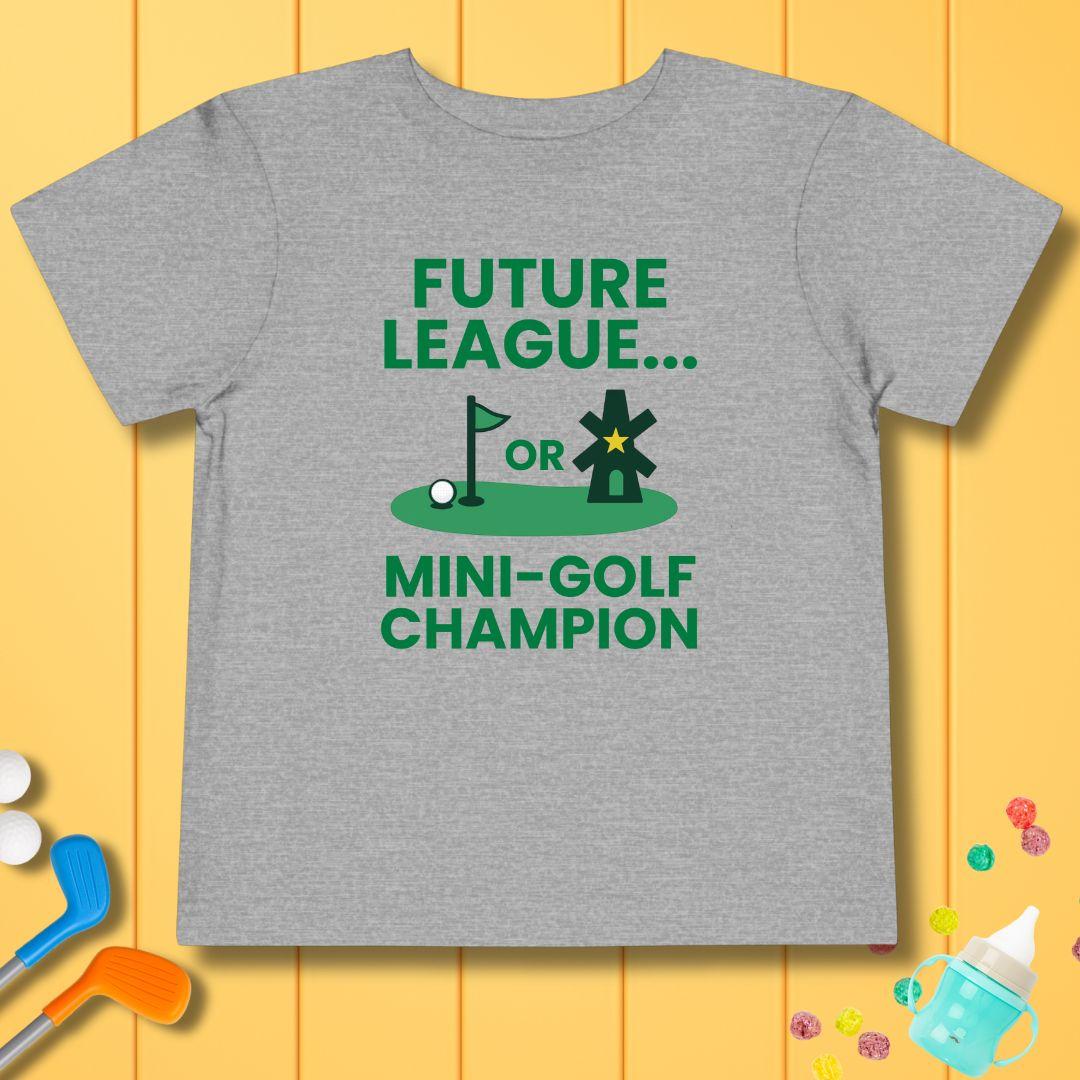Future League… or Mini-Golf Champion - Funny Toddler Golf T-Shirt in Athletic Heather, great for casual wear. Find more fun golf focused products at oneforetheages.com