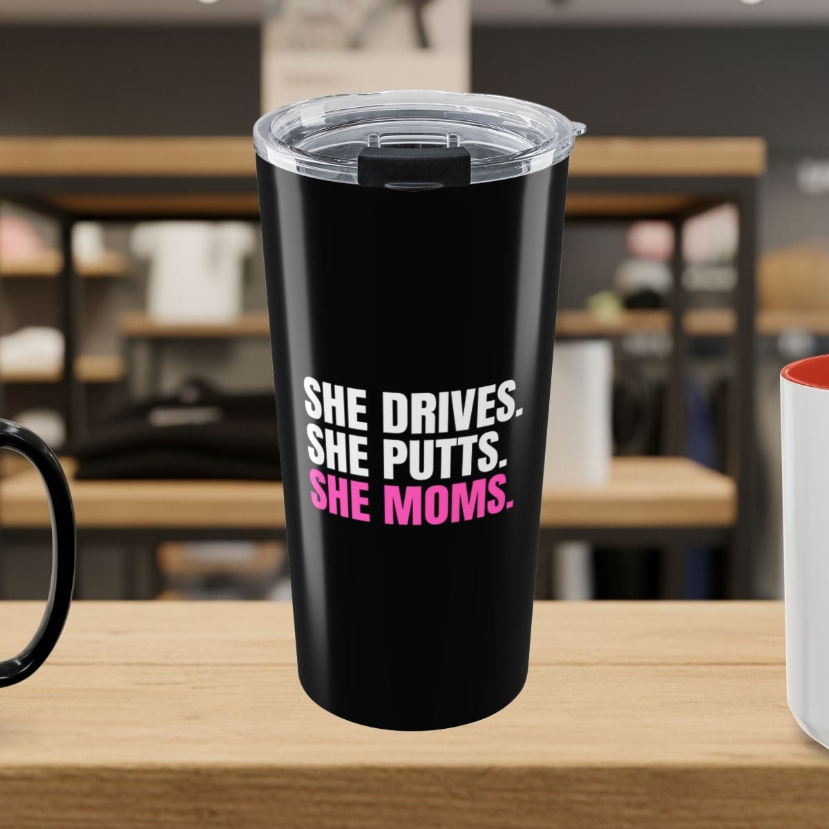 SHE DRIVES. SHE PUTTS. SHE MOMS. - 20oz Tumbler in Black