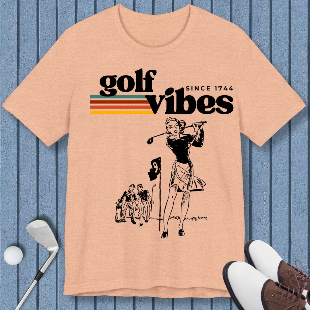Golf Vibes | Retro T-shirt in Heather Peach, great for casual wear. Find more fun golf focused products at oneforetheages.com