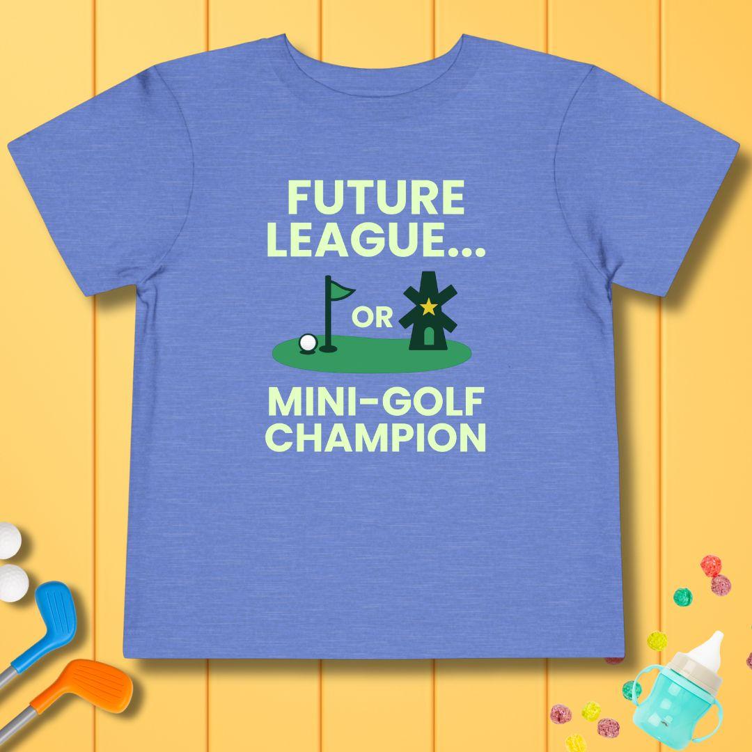 Future League… or Mini-Golf Champion - Funny Toddler Golf T-Shirt in Heather Columbia Blue, great for casual wear. Find more fun golf focused products at oneforetheages.com