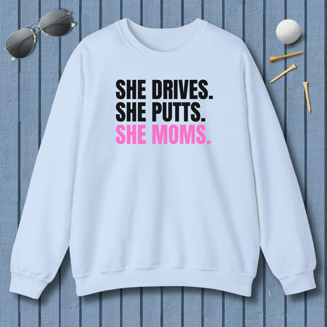 SHE DRIVES. SHE PUTTS. SHE MOMS. - Adult Golf Sweatshirt in Light Blue